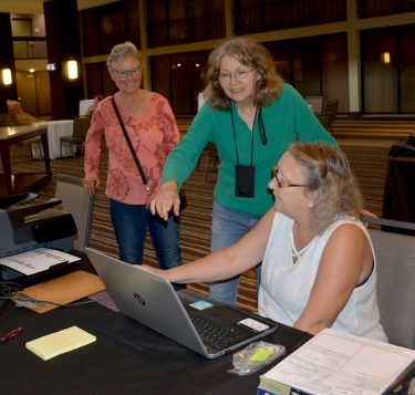 Susan, Neddie with Judy Buroker for 2018 Congress registration